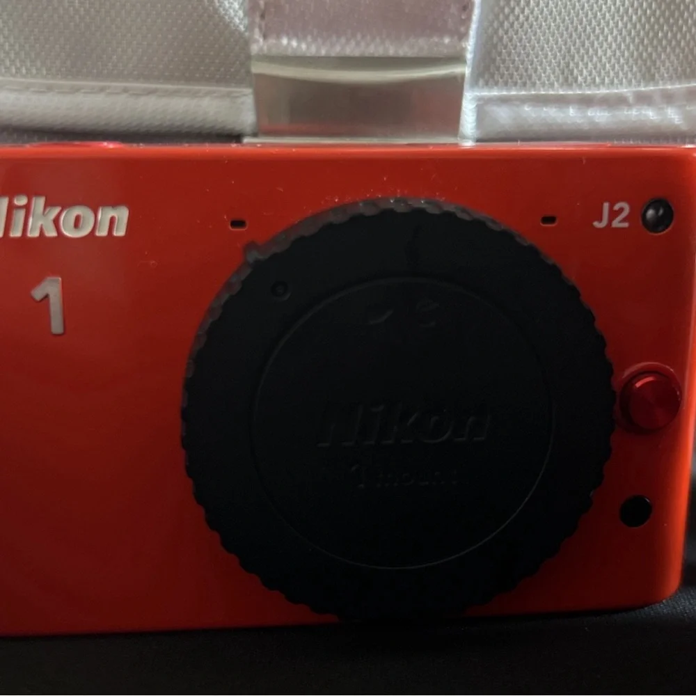 Nikon 1 J2 10.1 MP HD Digital Camera Bundle (Orange)